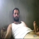 In this Turkish **** video he is lying on a bed with his shirt