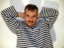 Aka -  a Naked Turkish Prisoner with a rock hard **** is handcuff. (id380)
