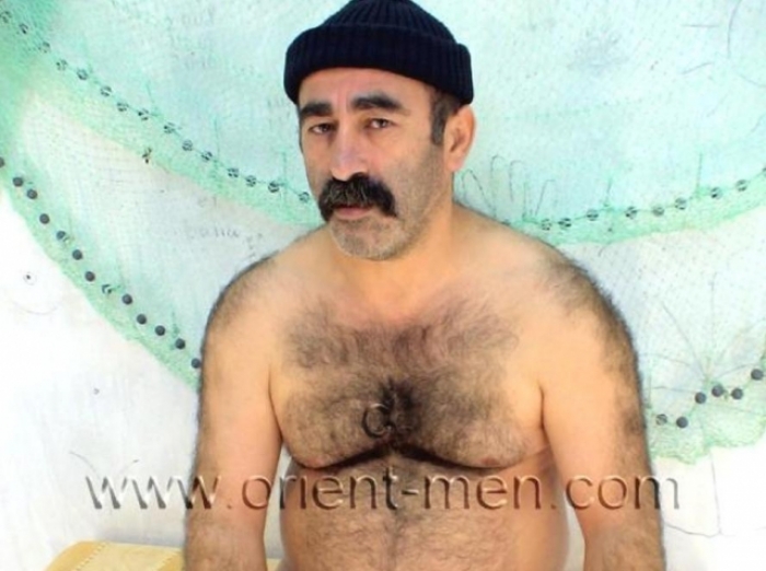 Huesyin - a very Hairy Turkish **** wanking naked in Rubber Boots (id357)