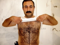 Hasan B. -  a very Hairy Kurdish Man with a very erotic Face strips naked. (id195)