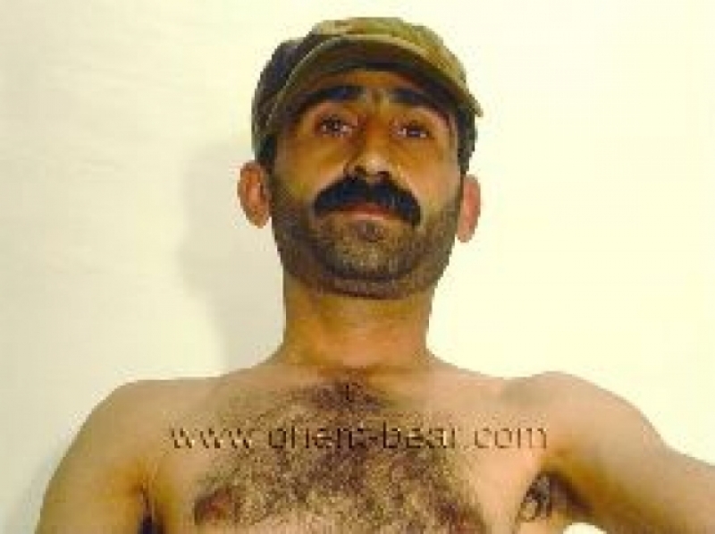 Haluk - a very hairy Naked Kurdish Soldier with a very hard **** and he shows his totally hairy ass in the dog position can be seen in a kurdish **** video. (id47)
