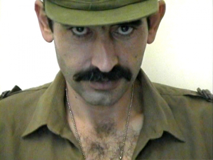 Hasan H. - is a young Hairy Turk with a rock 