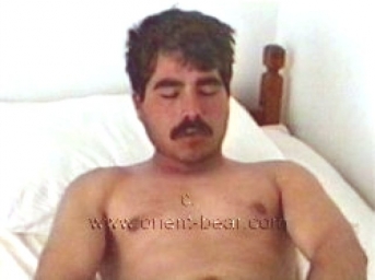 Buelent - a young Naked Turkish Man with a huge black Bush jerks in a Oldy Turkish **** Video. (id967)
