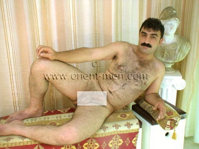 go to this turkish **** video. He has a sexy very masculine, oriental face with a horny mustache. In this turkish **** video he wears boxer shorts and a fes at the beginning. Then he strips naked and does a nice show. He shows his hairy body in many positions. With his cums**** he lies on a bench and there is a nice amount of cum. Everything ends up on his stomach. His cums**** can be seen from two camera positions. Tufan is a sexy young naked kurdish **** brave to see a hairy body in a turkish **** video.
