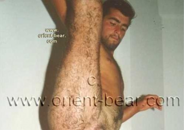 A young turkish karate fighter with a very hairy butt shows his perfect trained body in many positions. He strips naked and does very **** stretching, while his very horny hairy ass and the hairy notch are super to see. His **** is a normal size, his bush is trimmed and he has hairy thighs. He jerks in a balancing act and his cum lands on the parquet.