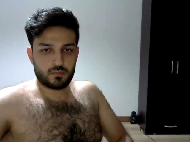 go here to this turkish **** p****o series. A young naked kurdish man with a very big **** from iraq in a turkish **** video.  His body is hairy and he has a beautiful face with a ****d. He has a very big **** with a very big **** head. His bush is heavily trimmed and the balls are shaved. In this turkish **** video he only sits in a sweater and without pants in front for his compute and sees something that makes him horny. His big **** is rock hard all the time.